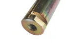 John Deere shear bolt L114111 for front axle TLS. Material metal, close-up